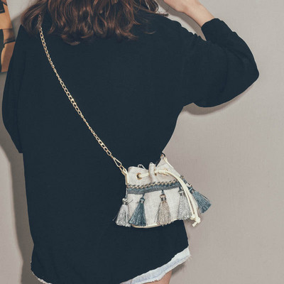 Stiilne naiste väike tuttidega õlakott