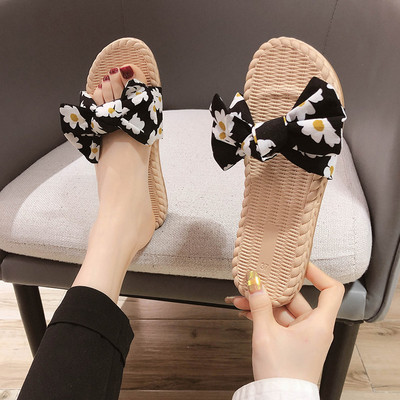 Modern női papucs szalaggal