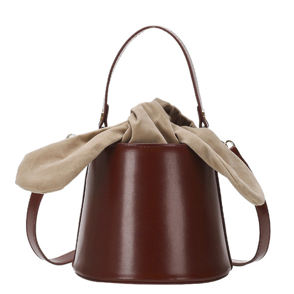 Aktuális női táska eco bőrből, hosszú füllel