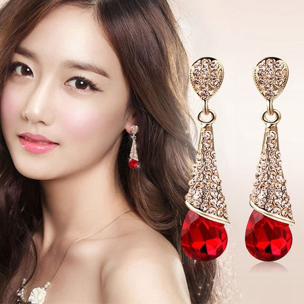 Elegáns női arany fülbevaló színes kővel