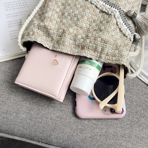 Modern női textiltáska bojttal