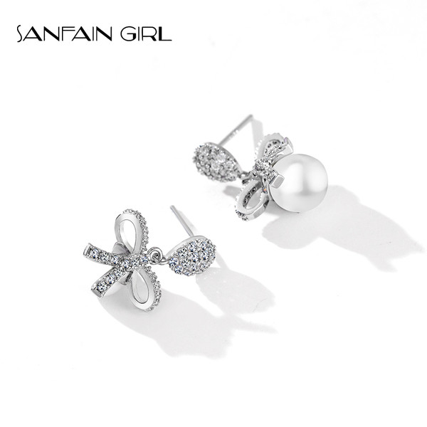 Női fülbevaló szalaggal és gyönggyel