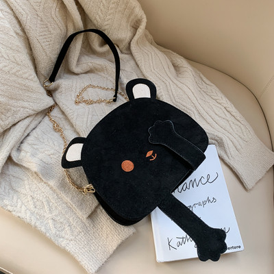 Aktuális női táska kerek formában, hosszú füllel