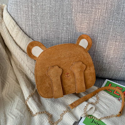 Aktuális női táska kerek formában, hosszú füllel