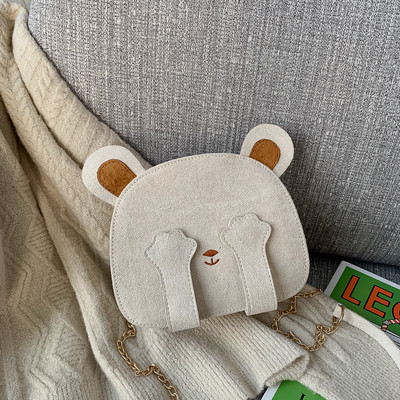 Aktuális női táska kerek formában, hosszú füllel