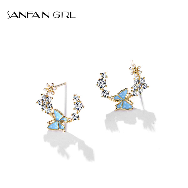 Egyszerű női fülbevaló pillangó alakú kövekkel és virágokkal