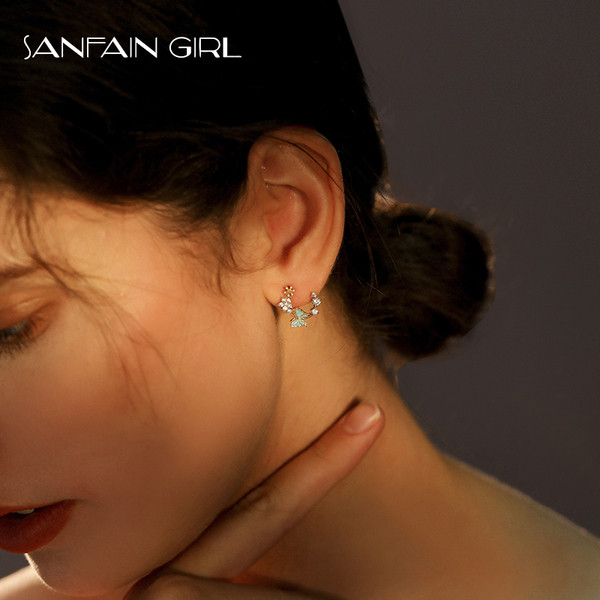 Egyszerű női fülbevaló pillangó alakú kövekkel és virágokkal