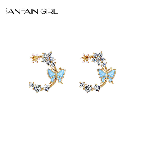 Egyszerű női fülbevaló pillangó alakú kövekkel és virágokkal