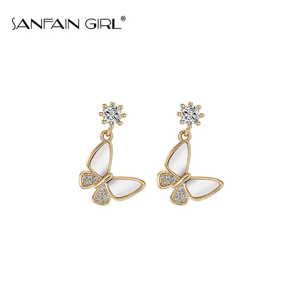 Egyszerű női fülbevaló pillangós medállal