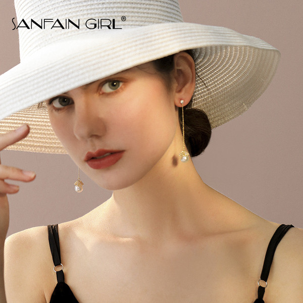 Elegáns női lógó fülbevaló hosszú lánccal és gyöngyházzal