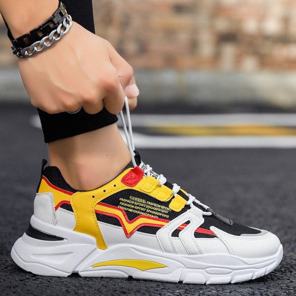 Feliratos, magas talpú, légáteresztő férfi tornacipő