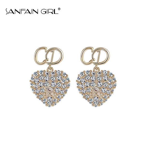 Elegáns női fülbevaló szív alakú kövekkel