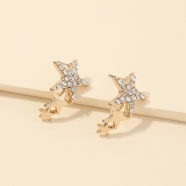 Modern női fülbevaló három csillaggal és kövekkel