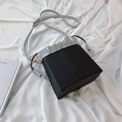 Stílusos női táska eco bőrből, sima modell, megkötős