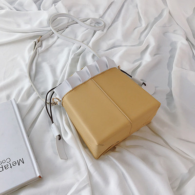 Stílusos női táska eco bőrből, sima modell, megkötős