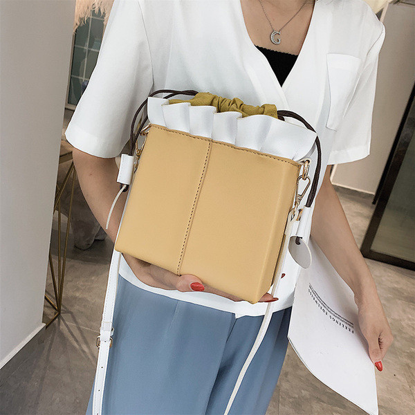 Stílusos női táska eco bőrből, sima modell, megkötős