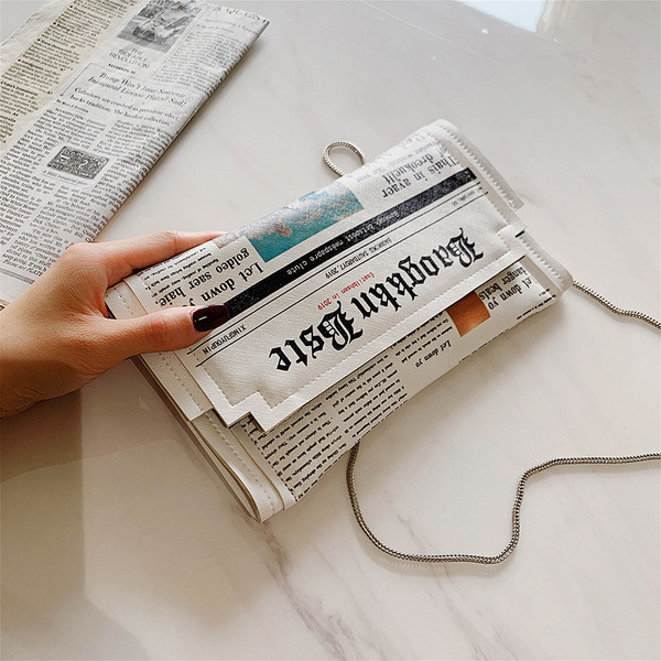 Sieviešu moderna eko-ādas soma ar garu metāla rokturi