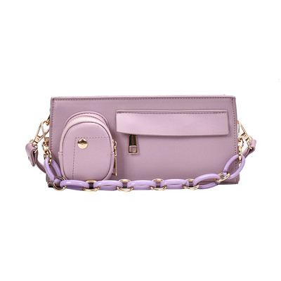 Eko bőrből készült stílusos női táska cipzárral és fém elemekkel