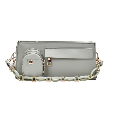 Eko bőrből készült stílusos női táska cipzárral és fém elemekkel