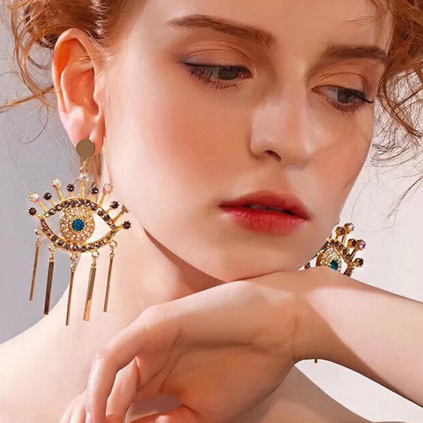 Karājoši sieviešu auskari acs formā