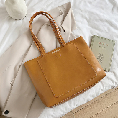 Liela sieviešu soma no eko ādas ar īsiem rokturiem