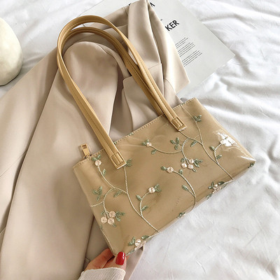 Modern női válltáska virágos hímzéssel