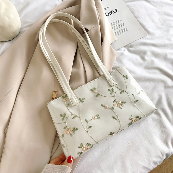 Modern női válltáska virágos hímzéssel