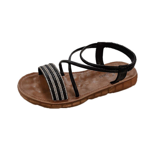 Női szandál lapos talppal és fényes pántokkal