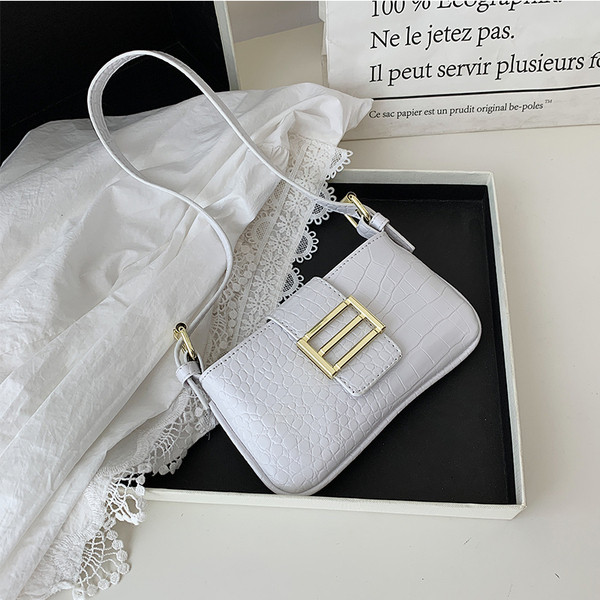 Öko-nahast moodne metallikinnitusega naiste õlakott