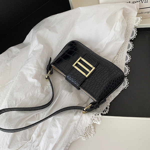 Öko-nahast moodne metallikinnitusega naiste õlakott