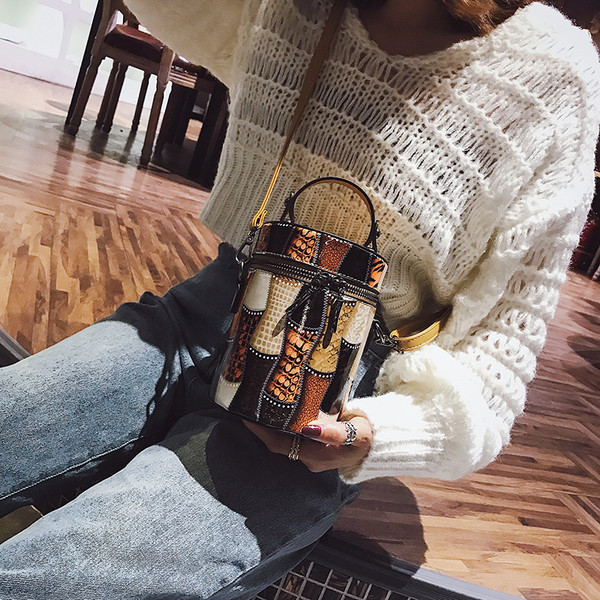 Stilīga sieviešu soma apaļā formā no eko ādas