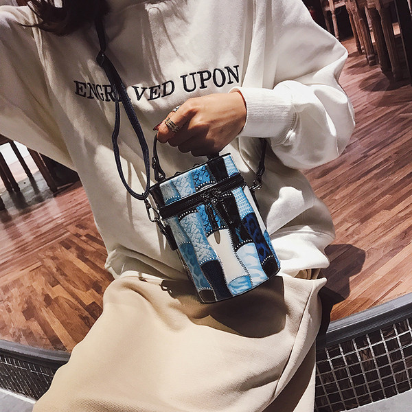 Stilīga sieviešu soma apaļā formā no eko ādas