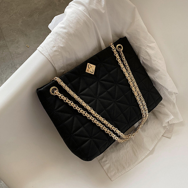 Stiilne kettsangadega ökonahast naistekott