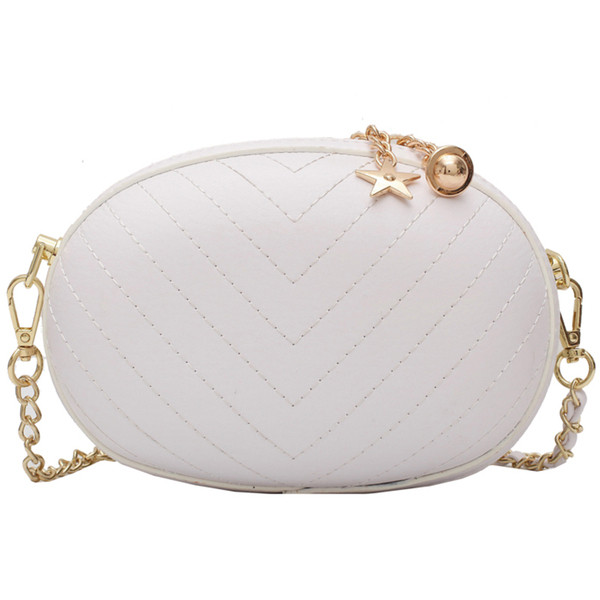 Moodne ümara kujuga pika metallist sangaga naistekott