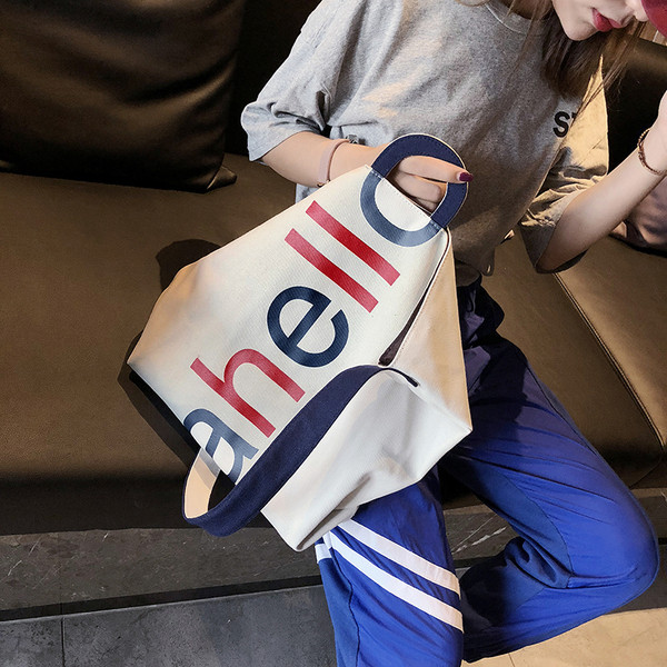 Női alkalmi textiltáska széles modell