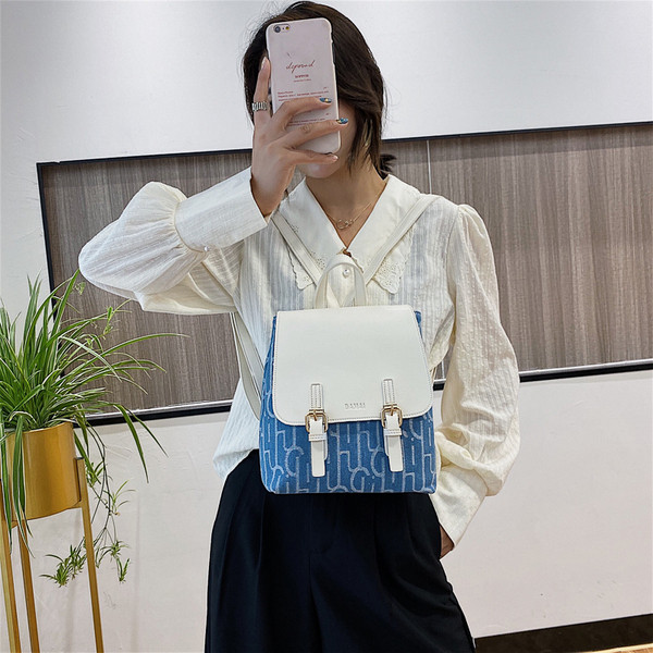 Sieviešu moderna eko-ādas mugursoma ar metāla elementiem