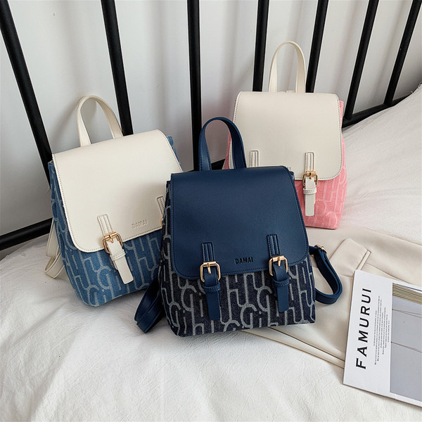 Sieviešu moderna eko-ādas mugursoma ar metāla elementiem