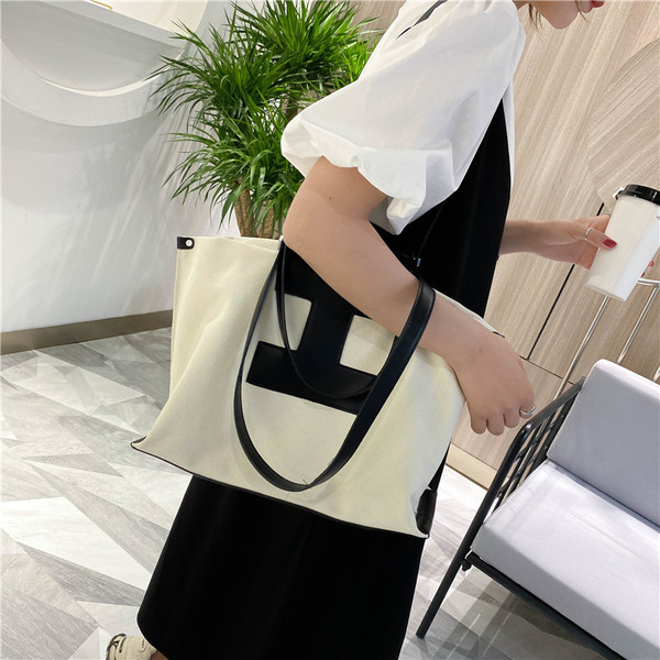 Sieviešu aktuālais somas platais tekstila modelis