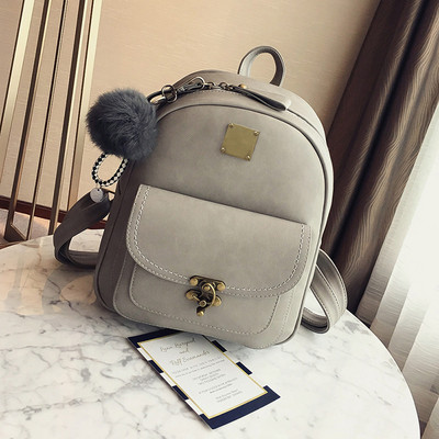 Női mindennapi hátizsák rövid fogantyúval, fém elemekkel