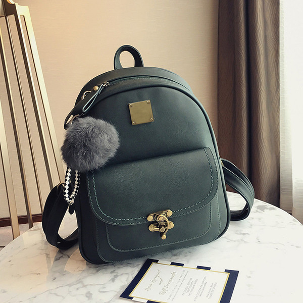 Női mindennapi hátizsák rövid fogantyúval, fém elemekkel