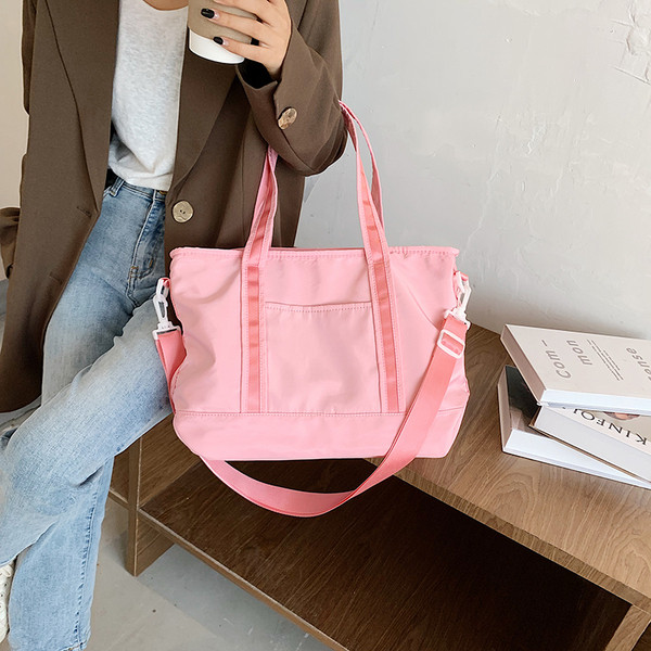 Női sporttáska rövid és hosszú füllel