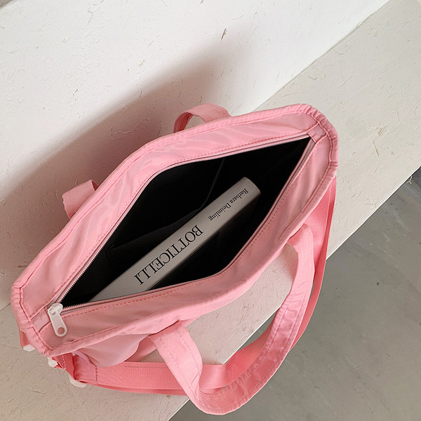 Női sporttáska rövid és hosszú füllel