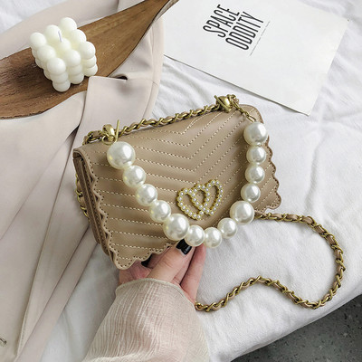 Stilīga rokassomiņa ar akmeņiem un pērlēm