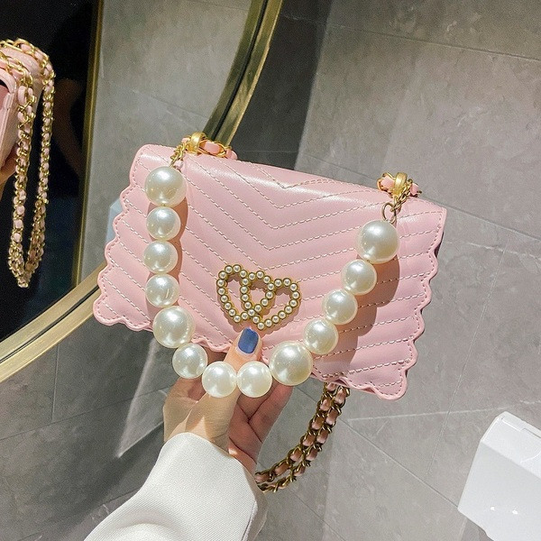 Stilīga rokassomiņa ar akmeņiem un pērlēm