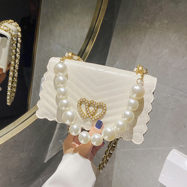 Stilīga rokassomiņa ar akmeņiem un pērlēm