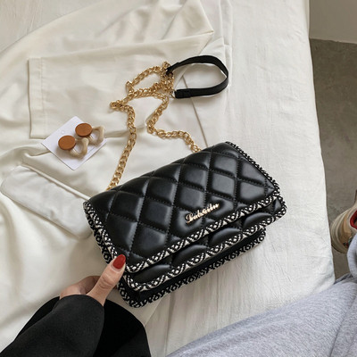 Modern ökobőr táska hosszú fém fogantyúval