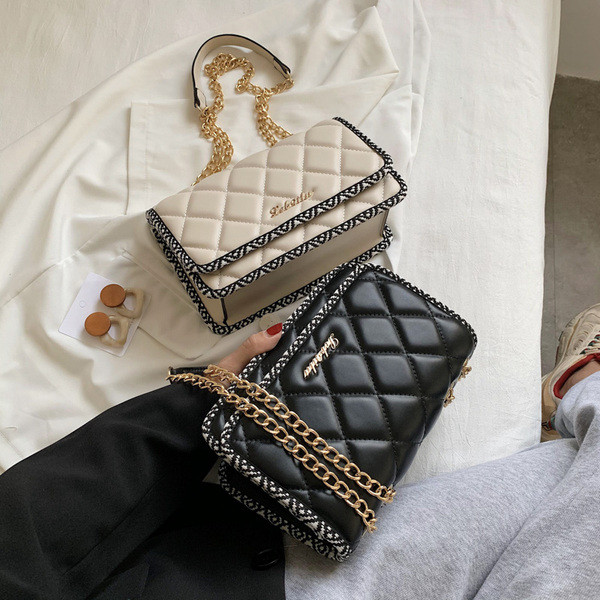 Modern ökobőr táska hosszú fém fogantyúval