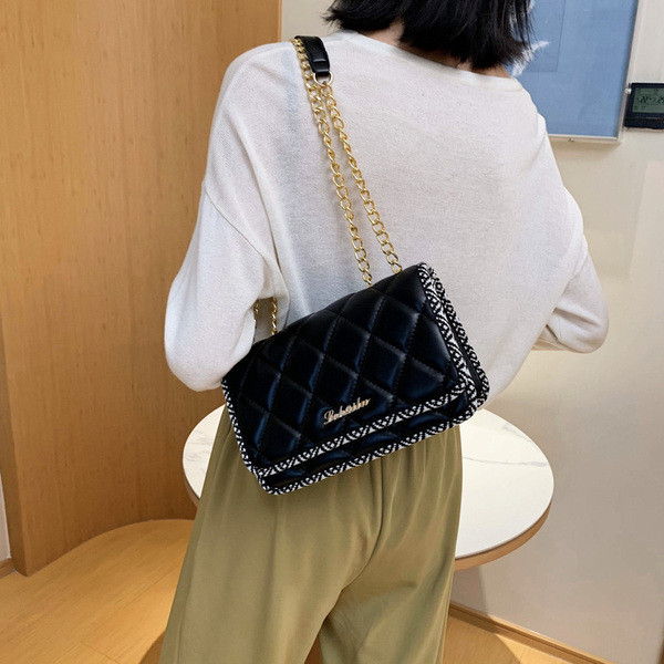 Modern ökobőr táska hosszú fém fogantyúval