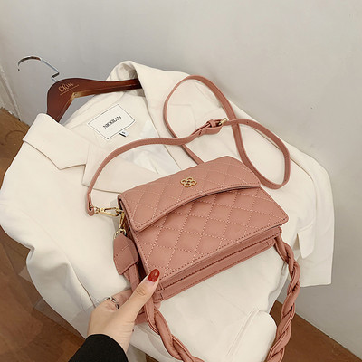 Új modell eko bőrből készült női táska hosszú füllel, fém díszítéssel