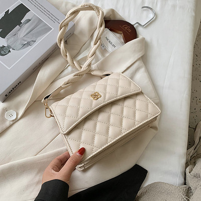 Új modell eko bőrből készült női táska hosszú füllel, fém díszítéssel